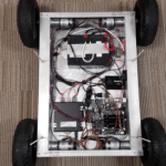 Interior of the GLIMRbot Base Unit showing Power Supply, Control. Computer, Motors for All Four Wheels, etc.